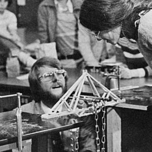 Physics teacher David Vernier testing bridge design in his classroom