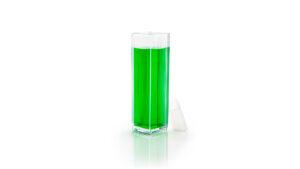 A cuvette with green food coloring.