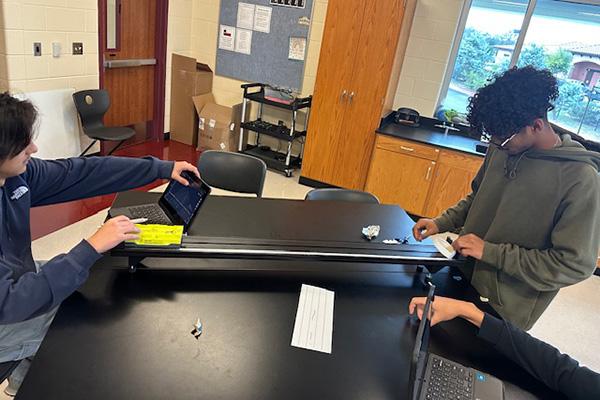 Students use Vernier data-collection technology to investigate velocity and force.