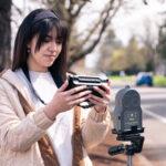 A student collects pollution data from passing cars with the Go Direct Air Quality and LabQuest 3