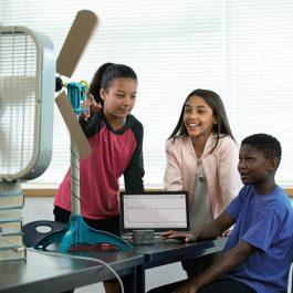 Students investigate the energy production from their wind turbine blade designs